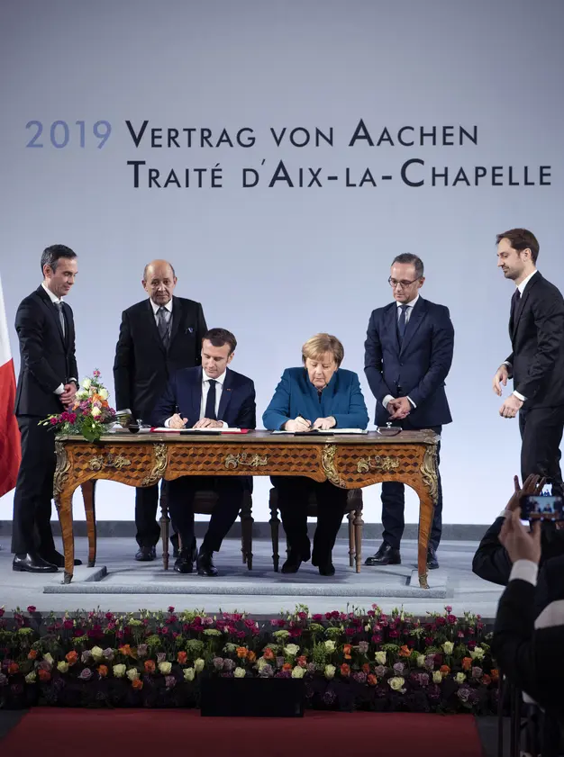 Emmanuel Macron et Angela Merkel lors de la signature du traité d'Aix-la-Chapelle